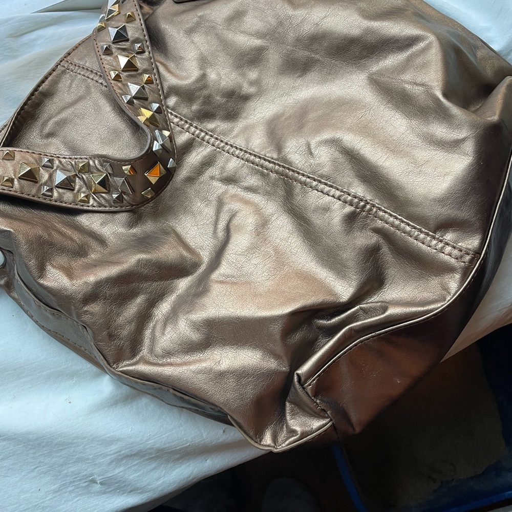 Carlos Santana handbag,